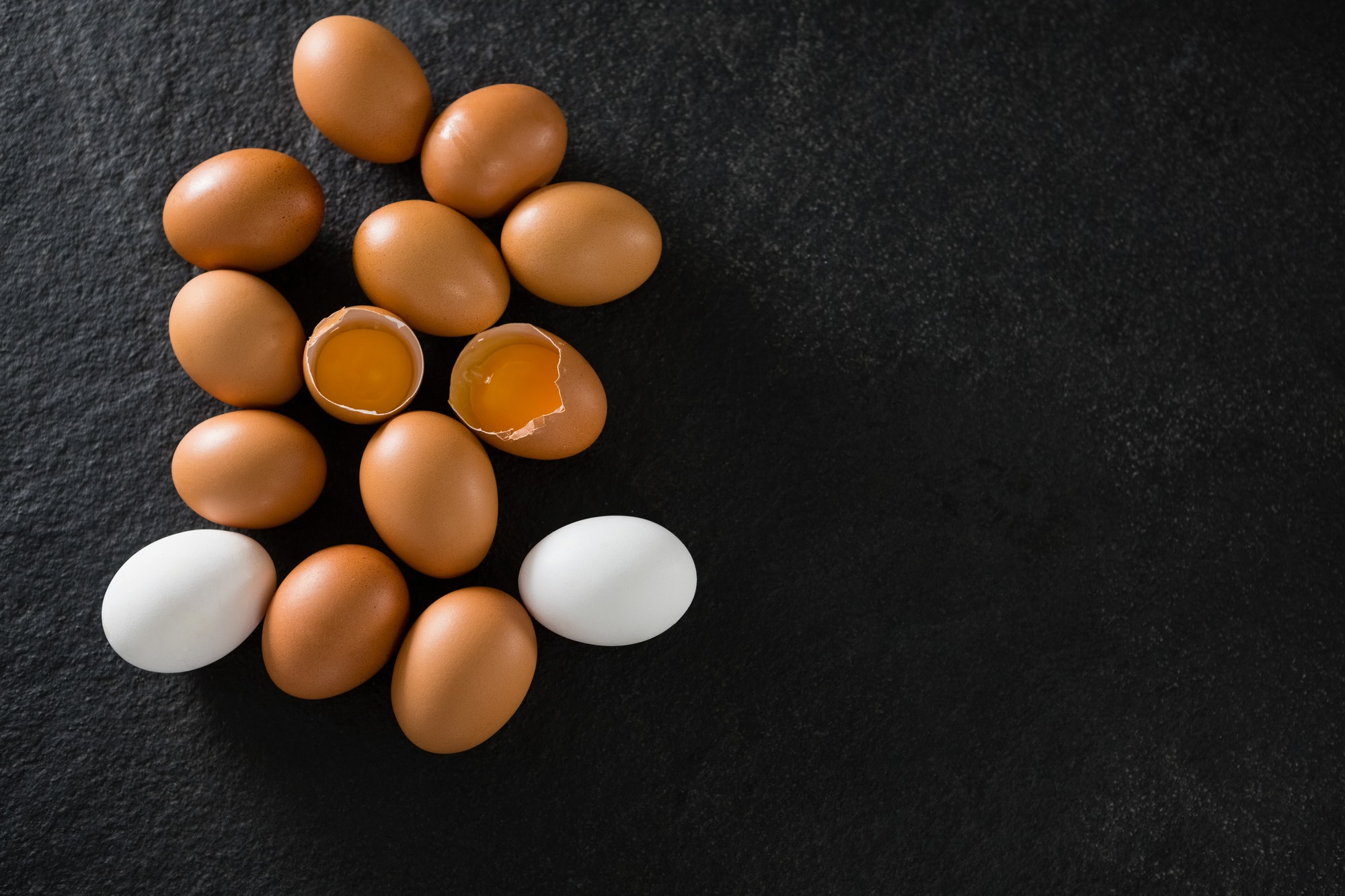 Eggs on black background